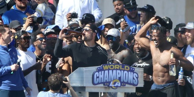 Matthew Stafford (center left) of the Los Angeles Rams celebrates on stage during the victory parade at Super Bowl LVI on February 16, 2022, in Los Angeles, California. 