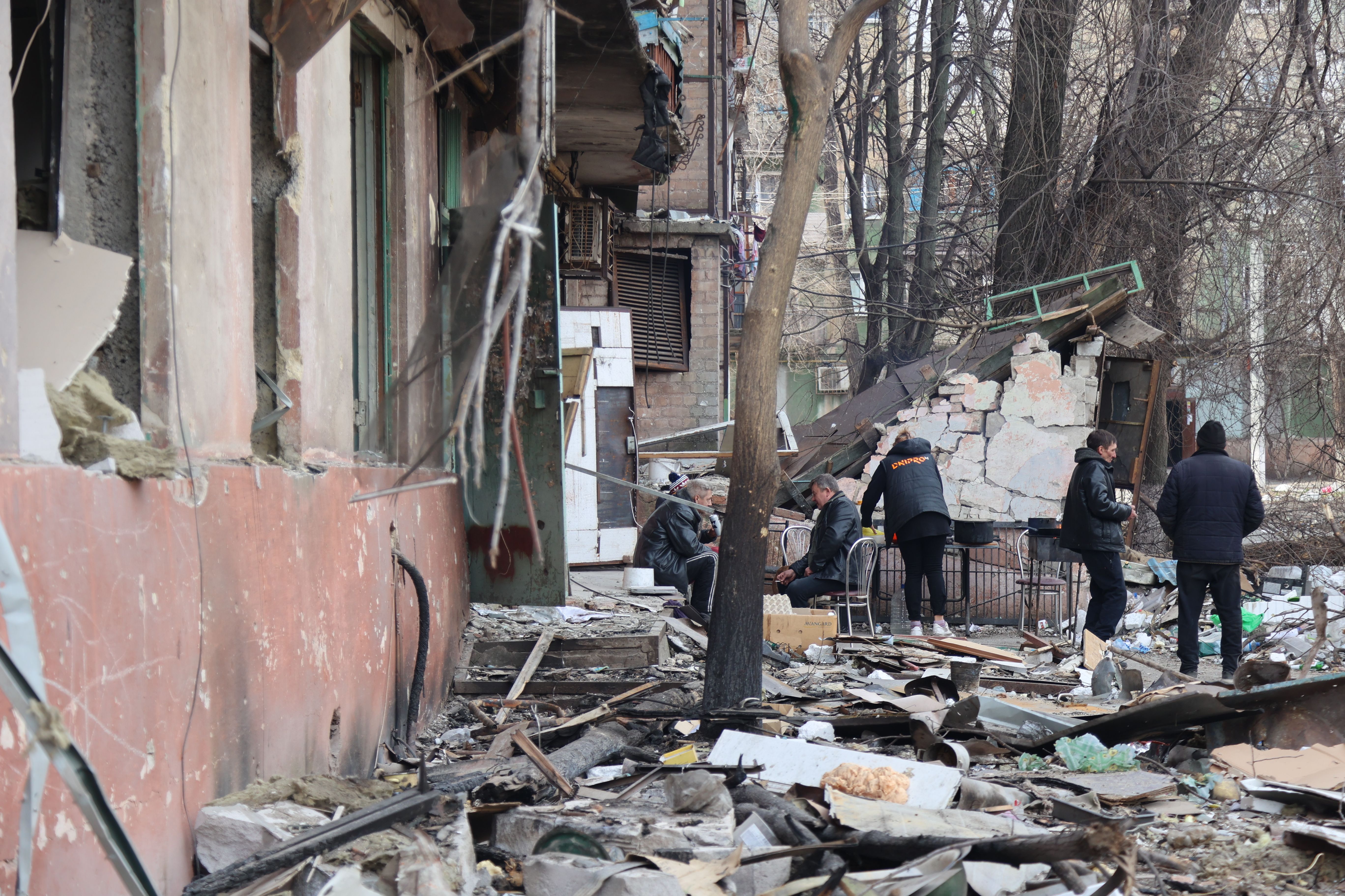     A view of damaged buildings and vehicles after the bombing of the Ukrainian city of Mariupol, which is under the control of the Russian army and pro-Russian separatists, on March 29.