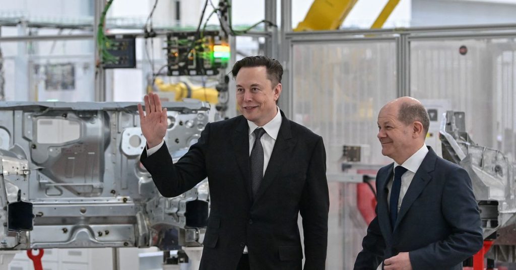 Dancing Musk hands drivers the first Teslas from the new German gigfactory