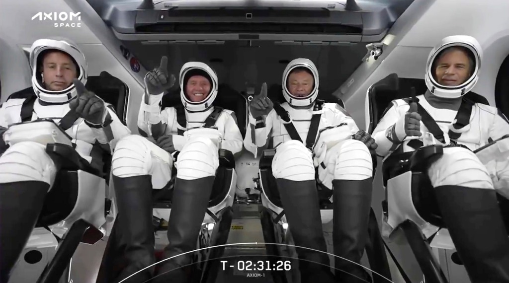 The crew includes a retired NASA astronaut and three private entrepreneurs who each paid $55 million to join the flight.
