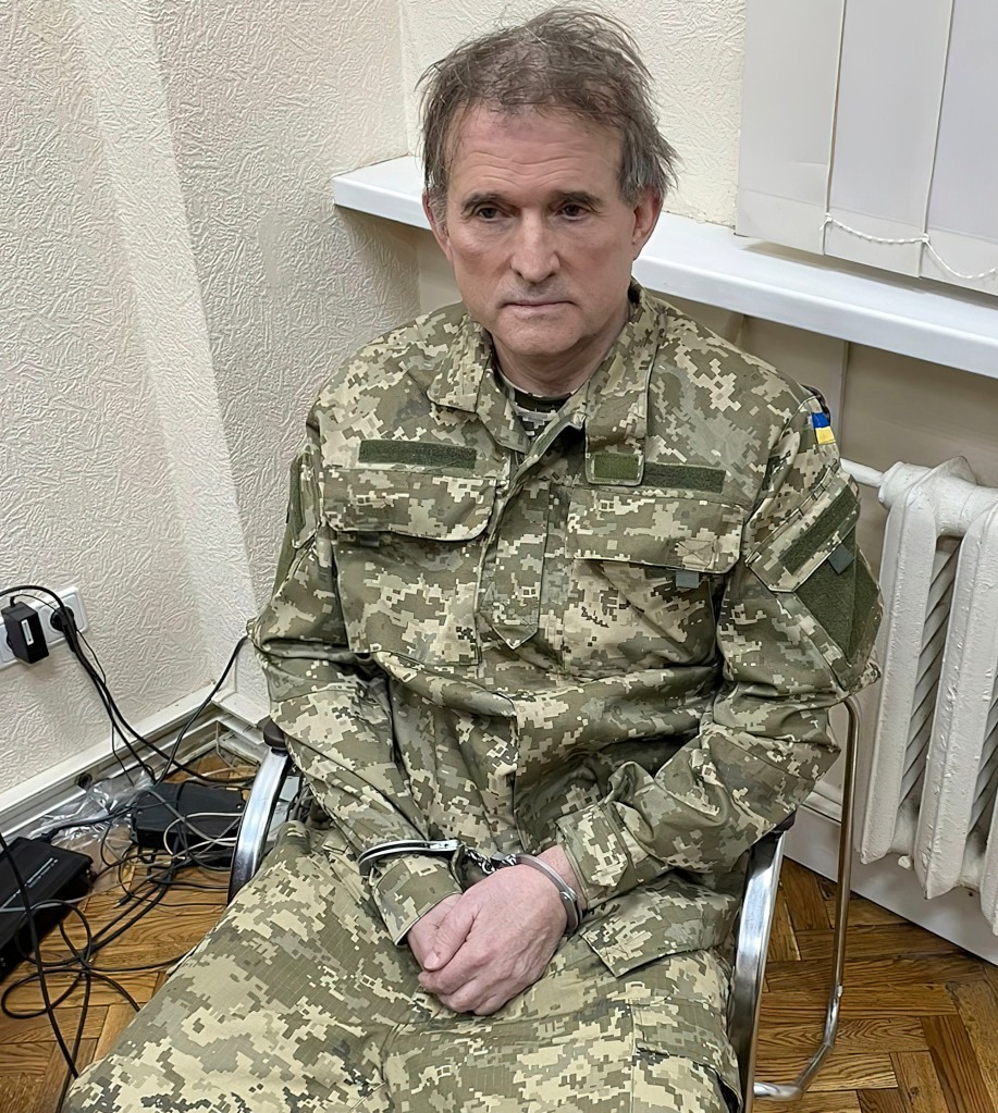 In this photo provided by the Ukrainian Presidential Press Office, oligarch Viktor Medvedchuk, the former leader of a pro-Russian opposition party and a close associate of Russian leader Vladimir Putin, sits handcuffed after his arrest in a special operation carried out by the country's secret intelligence service, Tuesday, April 12, 2022, in Ukraine.