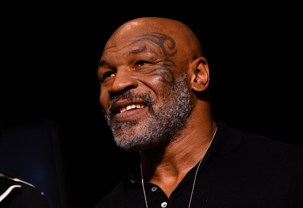 In this photo taken on November 5, 2021, former heavyweight boxing champion Mike Tyson attends welterweight boxers Canelo Alvarez and Caleb Plant in Las Vegas, Nevada. 