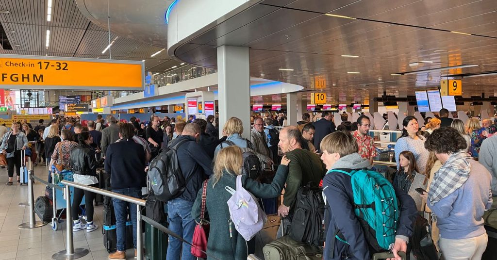 Strike causes chaos at Amsterdam airport as holiday begins