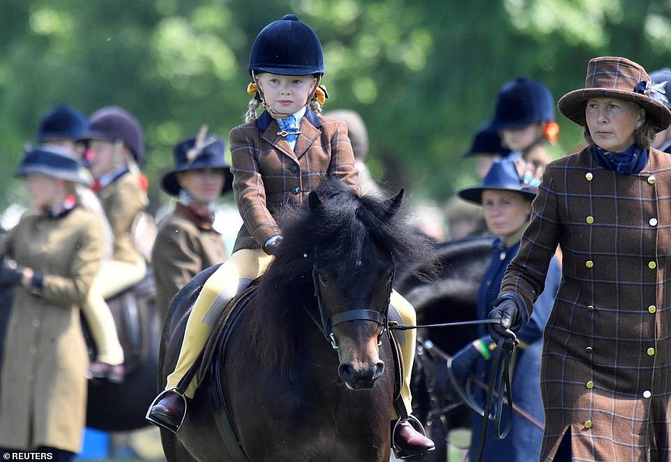 Entrants compete in the Rhine's Leading Open Class at Mountain and Moreland Moorland at the Royal Windsor Horse Show