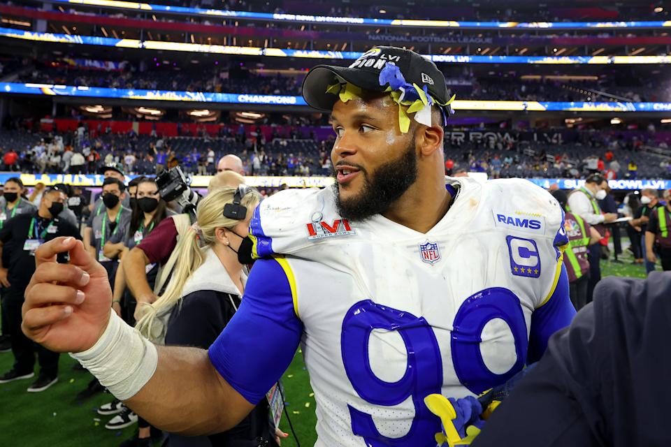 Aaron Donald #99 of the Los Angeles Rams celebrates after defeating the Cincinnati Bengals during the Super Bowl LVI game at SoFi Stadium on February 13, 2022 in Englewood, California.  The Los Angeles Rams defeated the Cincinnati Bengals 23-20.  (Photo by Kevin C. Cox/Getty Images)