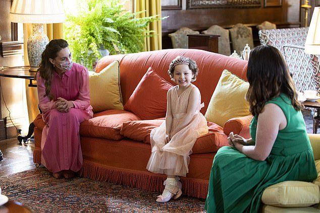 The Duchess of Cambridge kept her promise to wear pink when she met Mia in May last year at Holyrood House