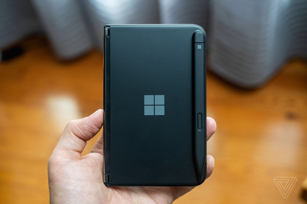 Surface Duo 2 black with Surface Pen bumper cover.