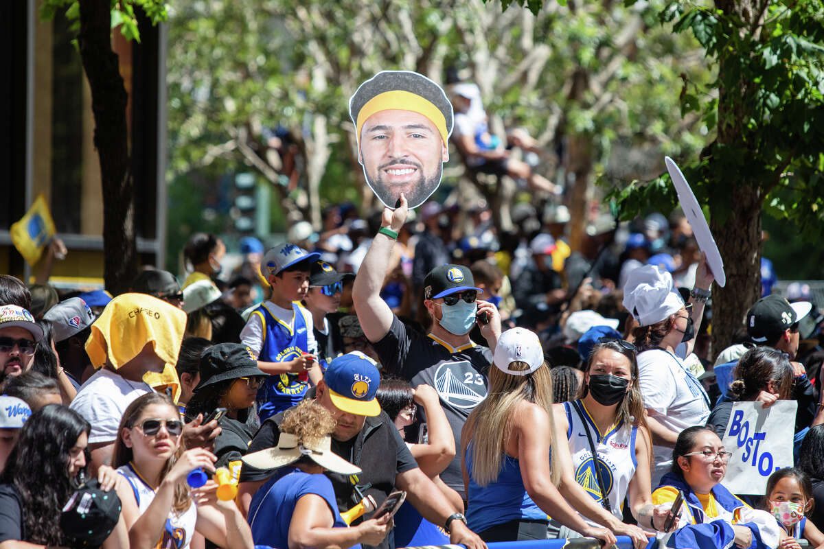 A fan holds a beheading Kay Thompson during the Golden State Warriors' Championship Parade on Market Street in San Francisco, California on June 20, 2022.