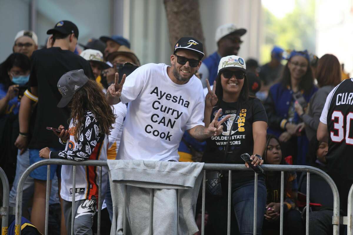 Golden State Warriors fans line up along Market Street ahead of the team's victory parade on June 20, 2022 in San Francisco.