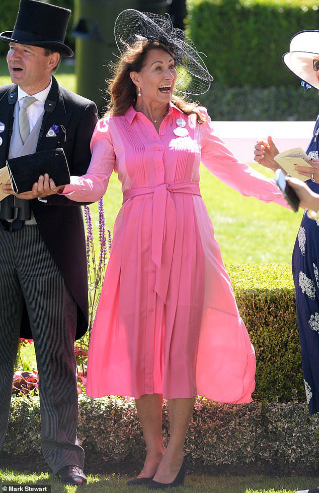 Carole Middleton (pictured) was photographed in a pink ME + EM silk dress while attending the first day of Royal Ascot today.  Daughter Kate was seen wearing the same dress last year