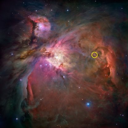 Hubble mosaic of the Orion Nebula with position HH 505 in a yellow circle