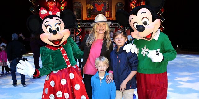 Actress Anne Heche with sons Atlas, center, and Homer, right, attending Disney On Ice Presents Let's Celebrate!  At the Staples Center on December 11, 2014 in Los Angeles, California. 