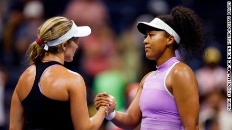 Danielle Collins shakes hands with Naomi Osaka after her first-round defeat. 