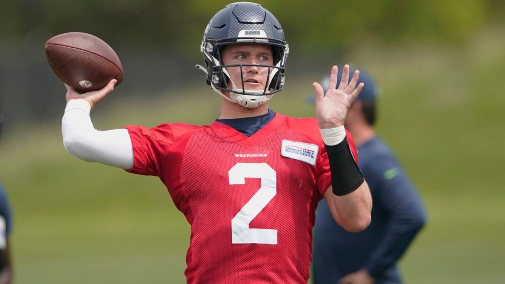 Seattle Seahawks' Drew Lock was pulling off during training before testing positive for COVID-19