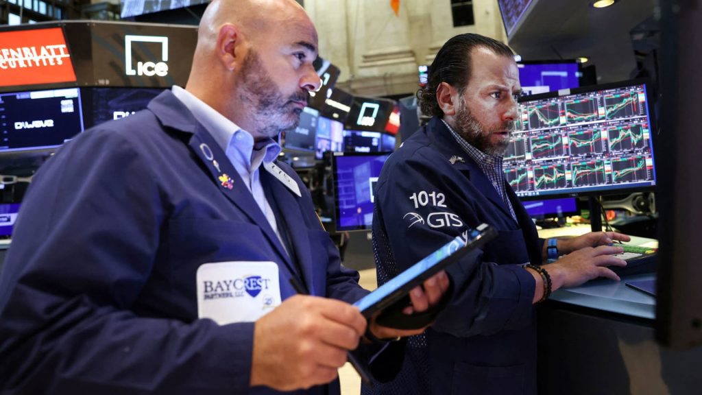 Stock futures drop as investors assess FedEx's dismal warning