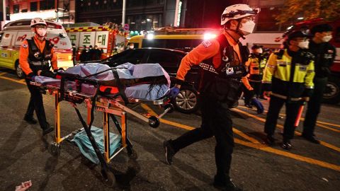 The body of a victim is carried on a stretcher in Itaewon, Seoul, South Korea on October 30.