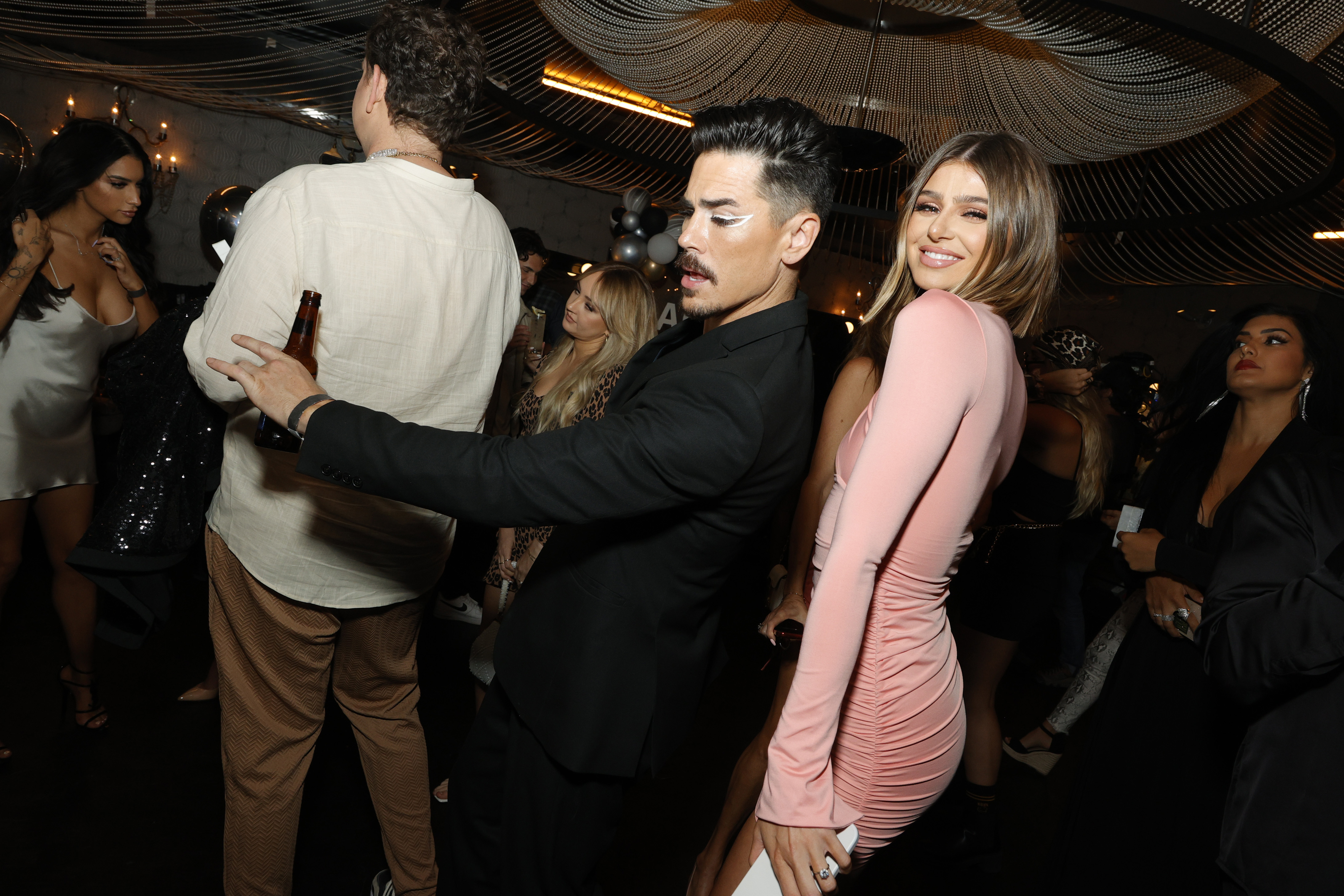Tom Sandoval and Raquel Leves at the party.