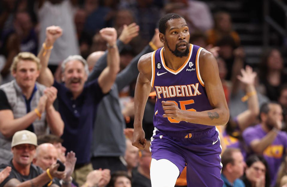 PHOENIX, AZ - MARCH 29: Kevin Durant #35 of the Phoenix Suns reacts after scoring against the Minnesota Timberwolves during the first half of an NBA game at Imprint Center on March 29, 2023 in Phoenix, Arizona.  Note to User: User expressly acknowledges and agrees that, by downloading or using this image, User agrees to the terms and conditions of the Getty Images license agreement.  (Photo by Christian Petersen/Getty Images)