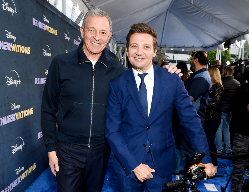 Bob Iger and Jeremy Renner at a movie premiere 
