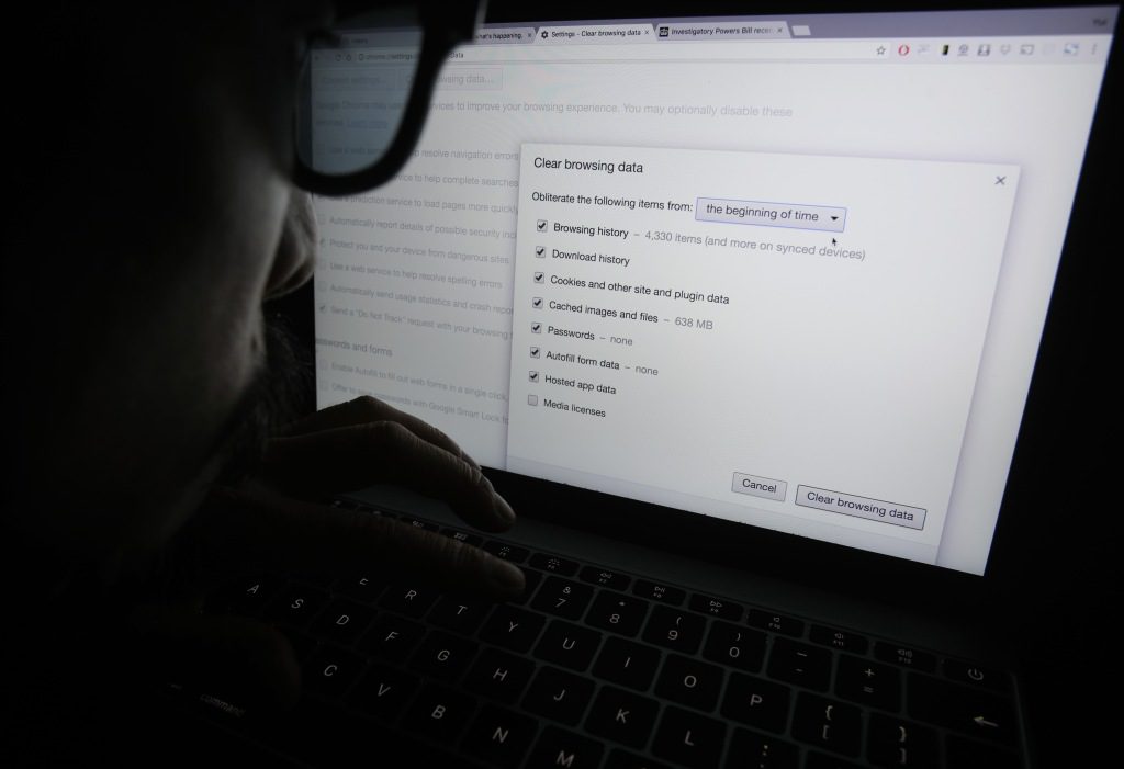 A laptop user looks at an option page in the Google Chrome internet browser that allows users to clear their online browsing data in London 