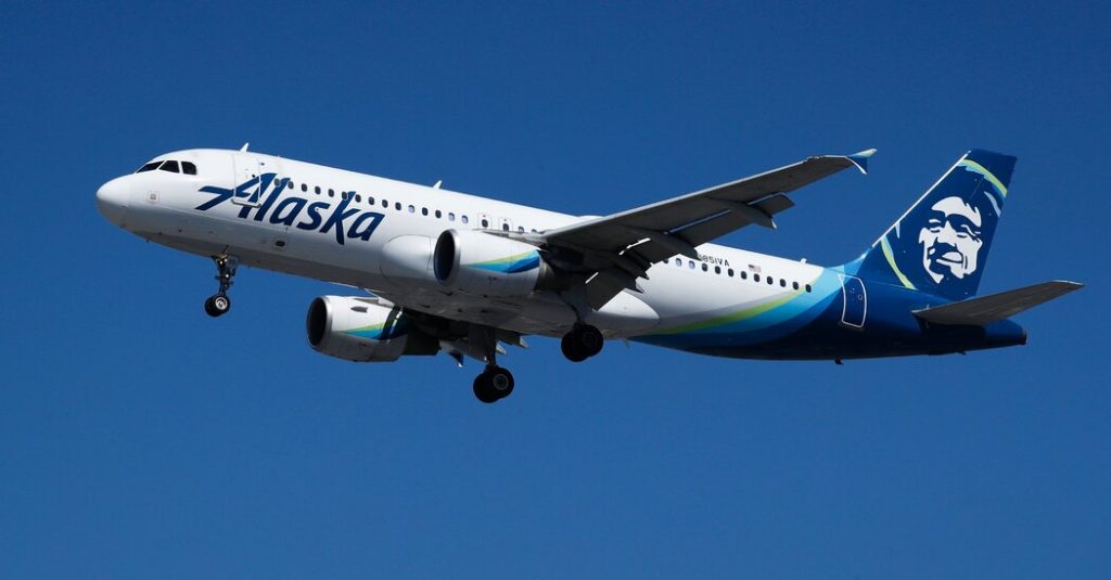 A passenger's flight was diverted after a woman threatened a flight attendant