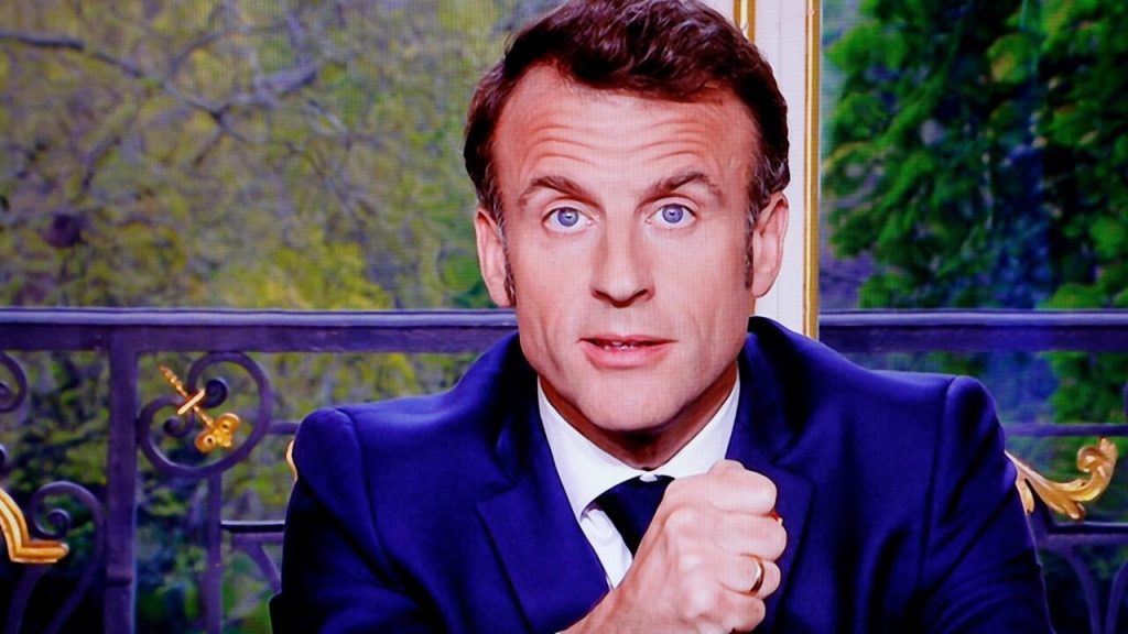 Macron was seen singing in the streets after his pension speech