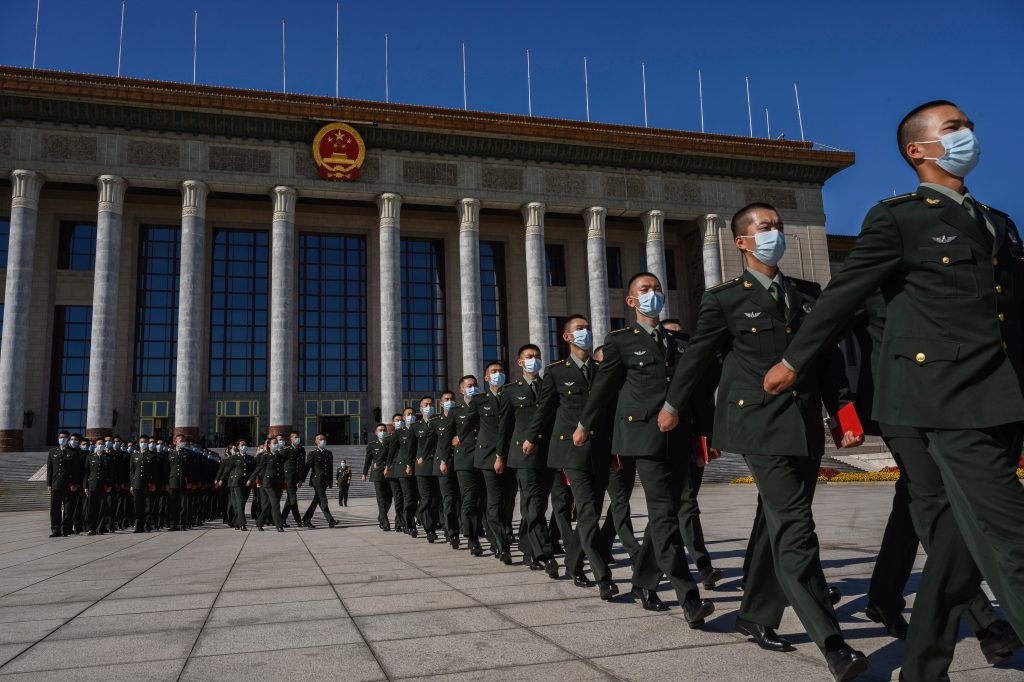 Chinese soldiers of the Chinese People's Liberation Army at a ceremony in Beijing in 2020.