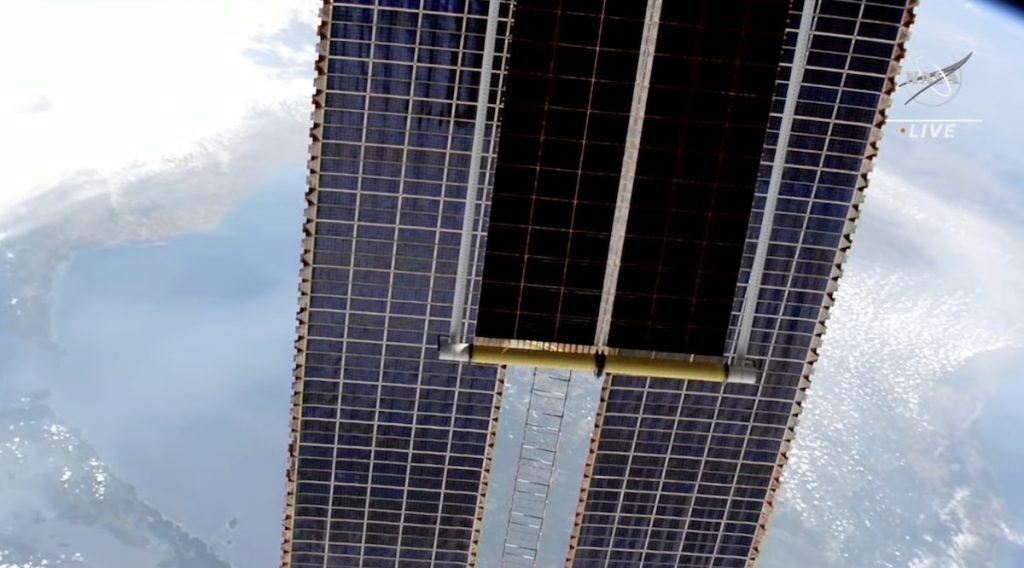 Astronauts install a new solar array outside the International Space Station - Spaceflight Now
