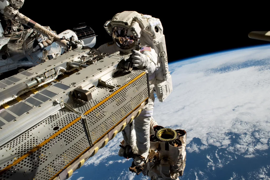 Astronauts finish installing the foldable solar array on a record-setting spacewalk