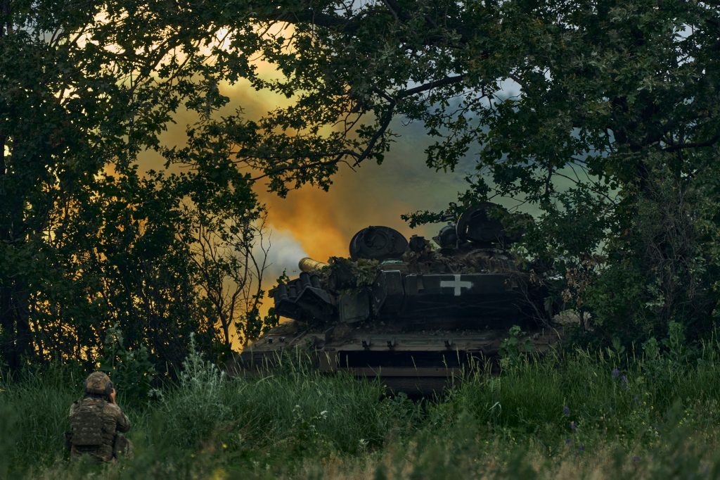 A Ukrainian tank fires towards Russian positions on the front line near Donetsk, Ukraine.