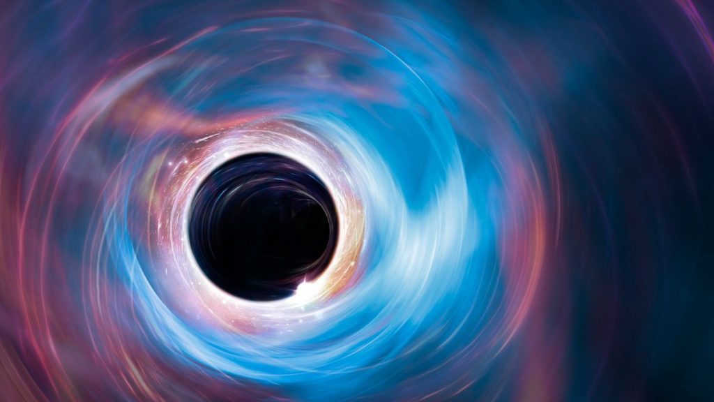 We see a. black hole illustration. It is surrounded by circles of blue and pink from its superheated accretion disc.