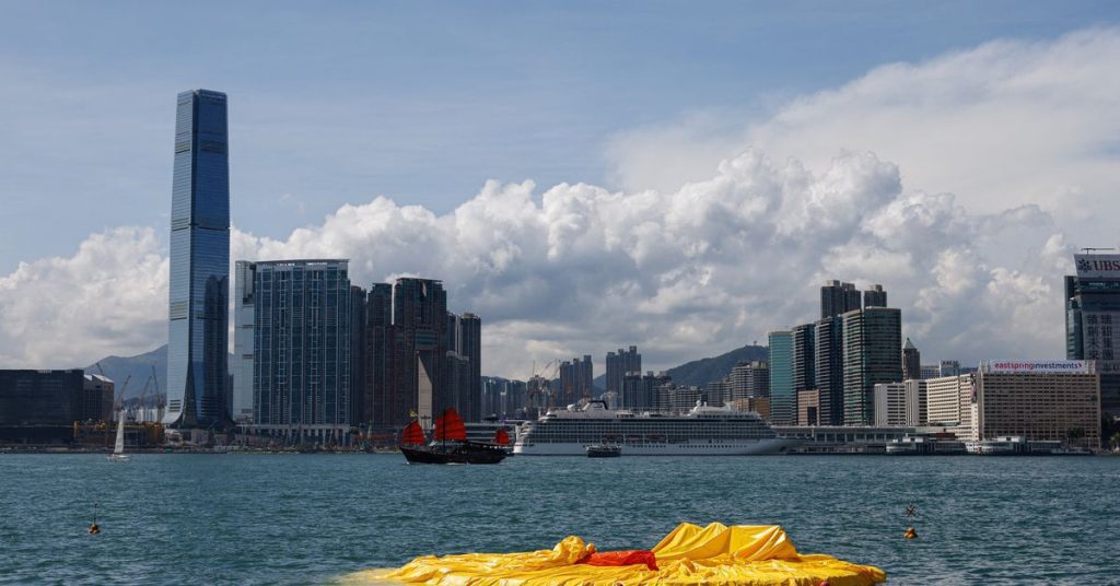One of two giant rubber ducks in Hong Kong harbor shrinks