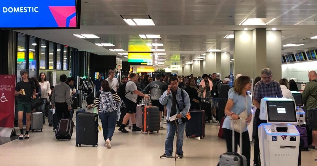 Travelers camp out at Newark Airport as delays and cancellations continue