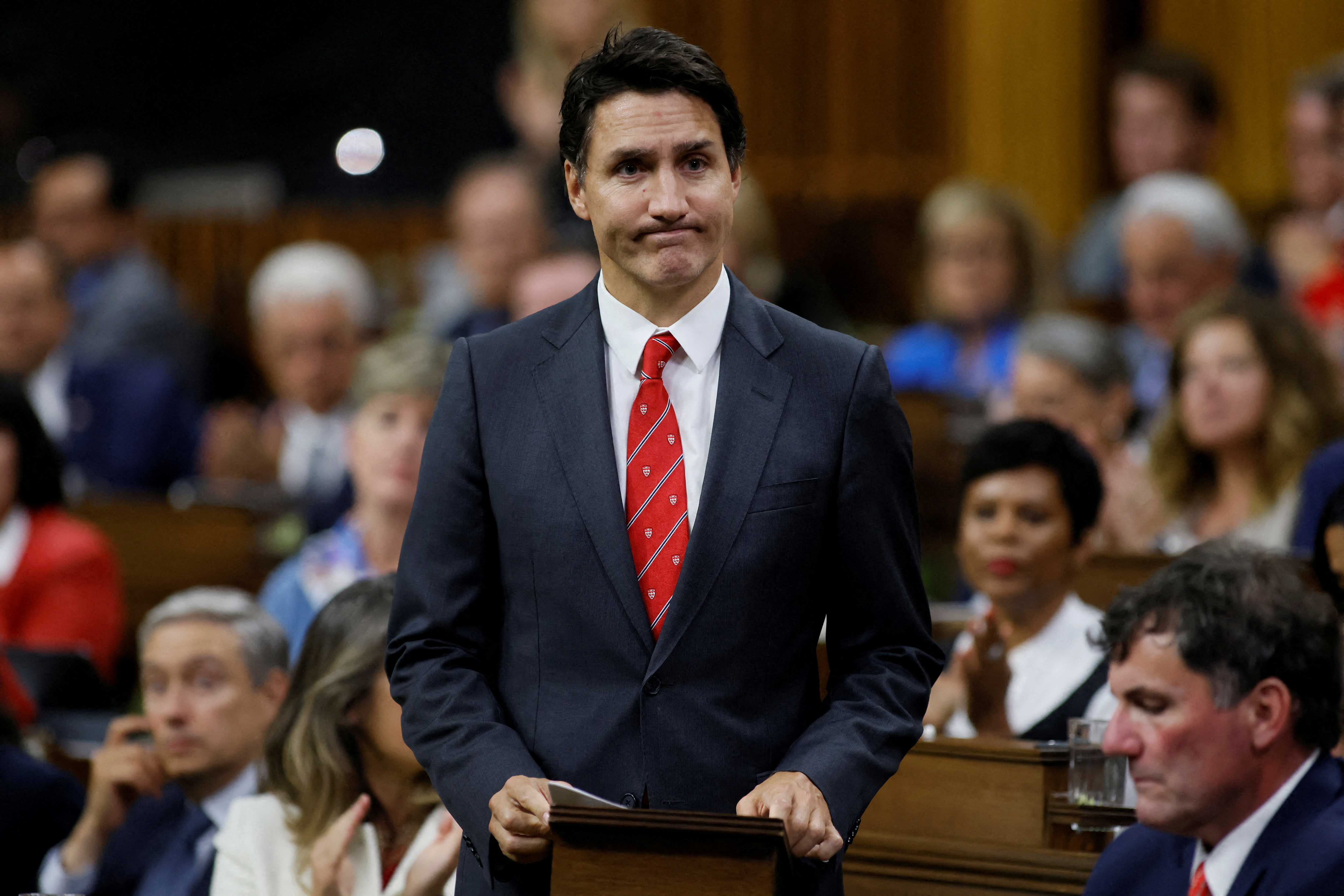 Canadian Prime Minister Justin Trudeau stands to make a statement in the House of Commons on Parliament Hill in Ottawa