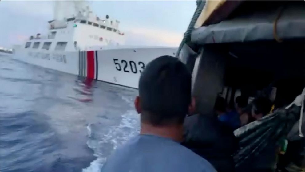 The Philippines says a coast guard ship and a supply boat were rammed by Chinese ships in disputed shoals