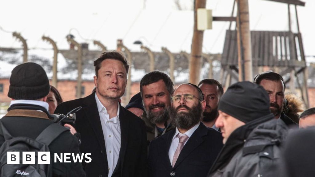 Elon Musk visits the Auschwitz death camp site