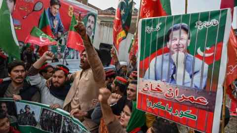 Supporters and activists of the Pakistan Tehreek-e-Insaf party chant slogans during a protest demanding the release of PTI leader Imran Khan, in Peshawar.