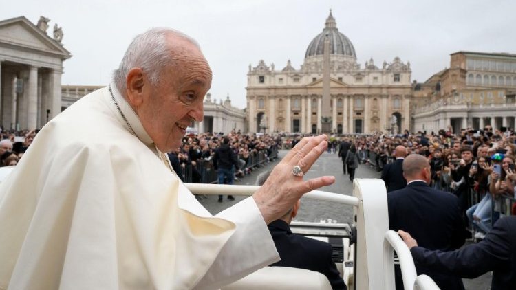 Pope Francis waves to crowds after Easter Mass